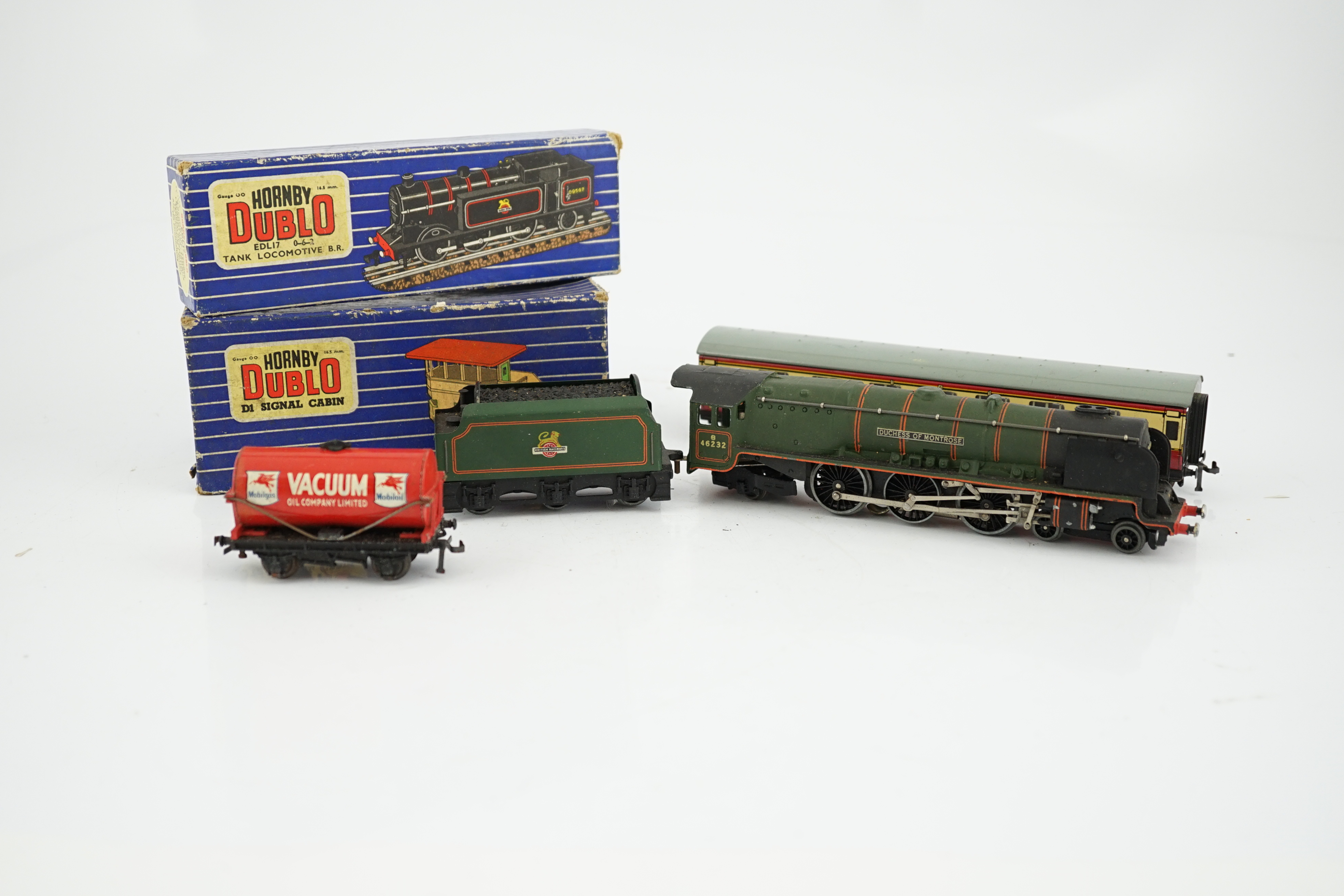 A collection of Hornby Dublo for 3-rail running, including two BR locomotives; a Duchess of Montrose and a Class N2 0-6-2T, together with two tinplate bogie coaches, wagons, signal box, signals, and a small quantity of t